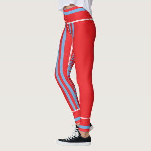 A colourful red and blue pattern encircled by a bl leggings
