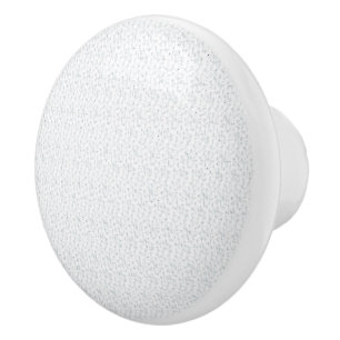 A completely white, featureless surface fills the ceramic knob