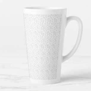 A completely white, featureless surface fills the latte mug