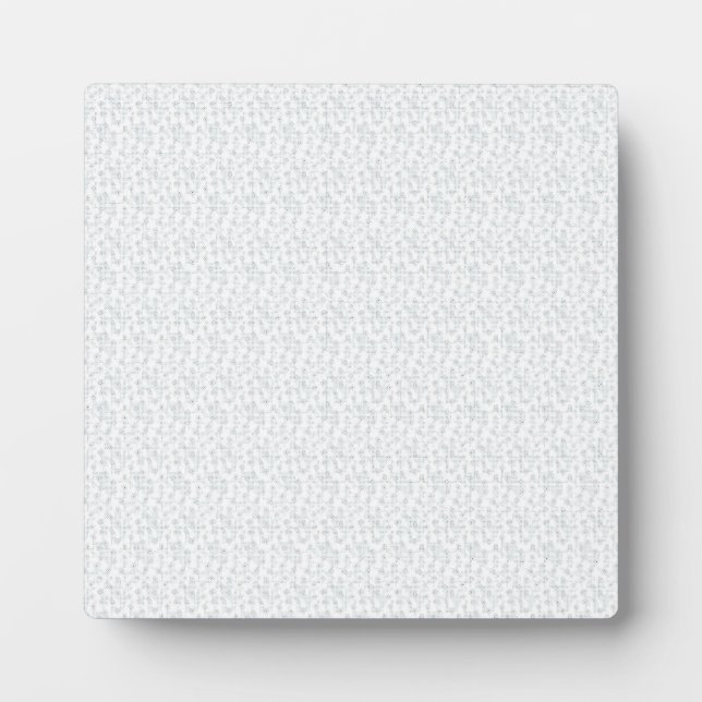 A completely white, featureless surface fills the  plaque (Front)