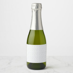 A completely white, featureless surface fills the sparkling wine label