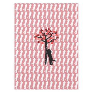 A Couple Kissing Leaning on a Tree of Hearts Tablecloth