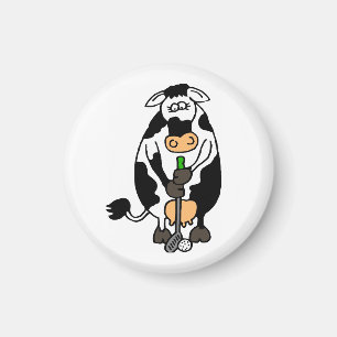 A cow playing golf magnet