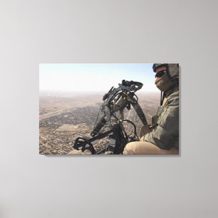 A crew chief looks for suspicious activity canvas print