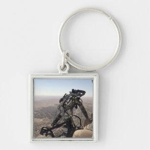 A crew chief looks for suspicious activity key ring