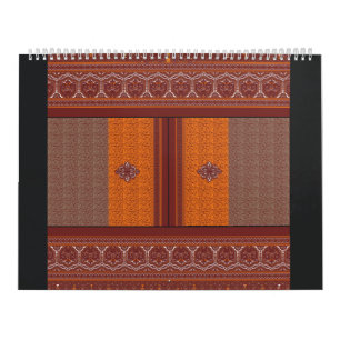 a cross stitch pattern in orange and brown calendar