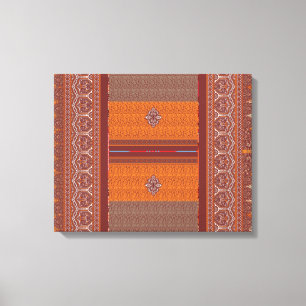 a cross stitch pattern in orange and brown canvas print