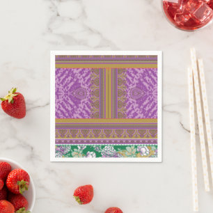  a cross stitch pattern with a purple and yellow b napkin