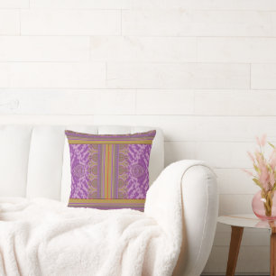a cross stitch pattern with a purple and yellow ba cushion