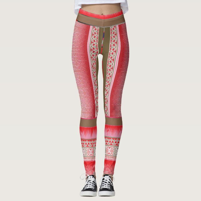 a cross stitch pattern with a red background leggings (Front)