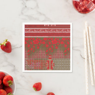 a cross stitch pattern with red flowers and vines napkin