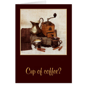 A cup of coffee - still life with coffee mill