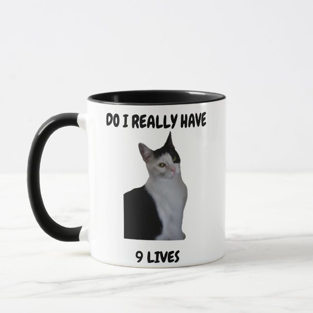 A Curious Cat With a Question Mug (Left)