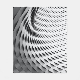 A curved facade covered in white latticework fleece blanket
