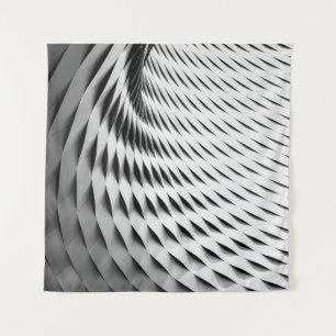 A CURVED FACADE COVERED IN WHITE LATTICEWORK TAPESTRY