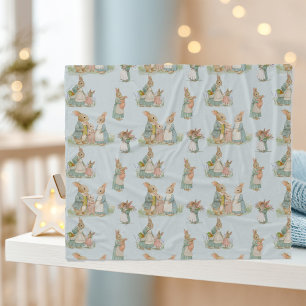a cute family of rabbits with a baby fleece blanket
