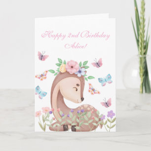 A cute fawn laying amount would flowers birthday card