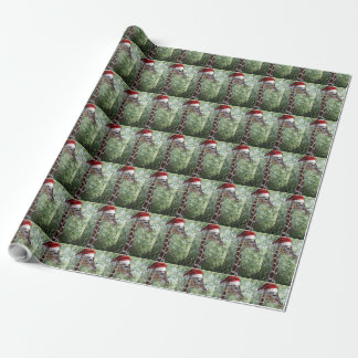 A Cute Giraffe wearing a Santa Claus Wrapping Paper