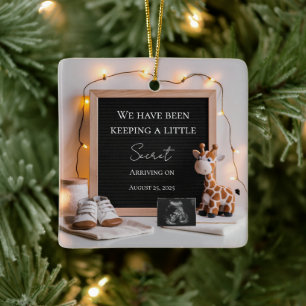 A cute joyful baby giraffe pregnancy announcement  ceramic ornament