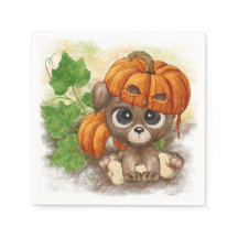 A cute puppy in a pumpkin hat