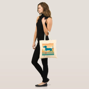 A cute tote bag with a wiener dog illustration