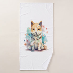 A cute well-behaved dog in a floral bath towel