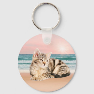 A Cuter Striped Cat Sitting on Beach with sunset Key Ring