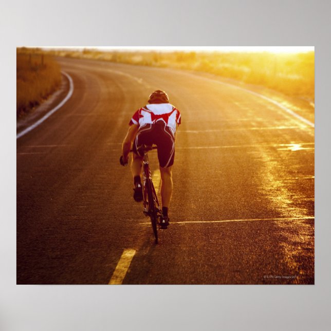 A cyclist on road bike near Great Salt Lake Poster (Front)