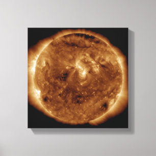 A dark rift in the sun's atmosphere canvas print