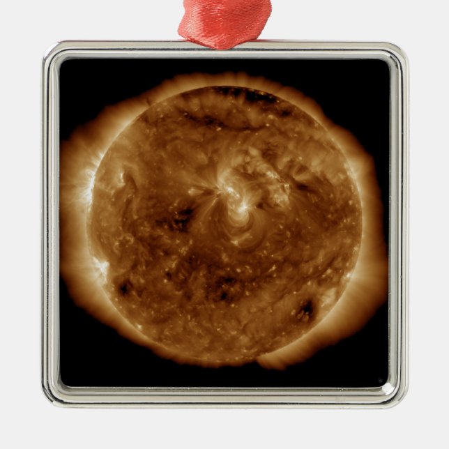 A dark rift in the sun's atmosphere metal tree decoration (Front)