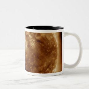 A dark rift in the sun's atmosphere Two-Tone coffee mug
