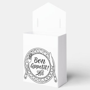 A decorative bon appetit sign with fork and knife favour box