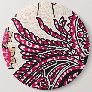 A decorative paisley design with vivid red and pin