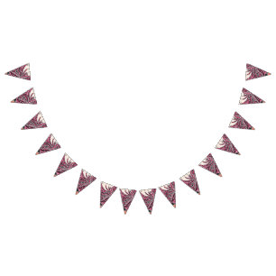 A decorative paisley design with vivid red and pin bunting 