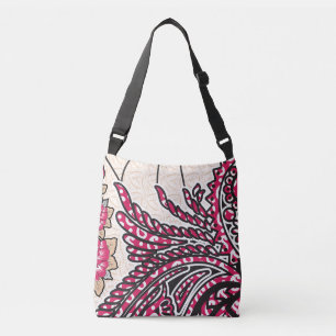 A decorative paisley design with vivid red and pin crossbody bag