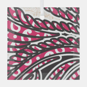 A decorative paisley design with vivid red and pin glass tree decoration