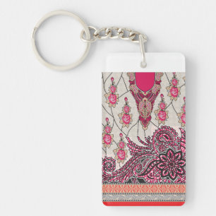 A decorative paisley design with vivid red and pin key ring