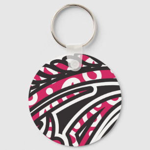 A decorative paisley design with vivid red and pin key ring