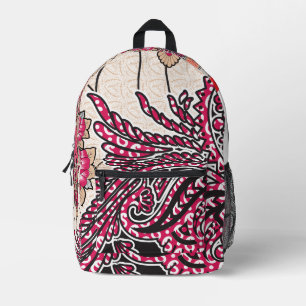 A decorative paisley design with vivid red and pin printed backpack