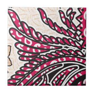 A decorative paisley design with vivid red and pin tile