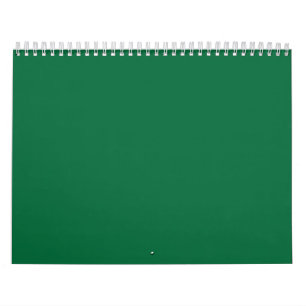 A deep green background contrasted by a crisp whit calendar