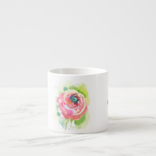 a delicate rose and a beetle sleeping in it espresso cup