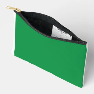 A dense, lush forest filled with vibrant green tre accessory pouch