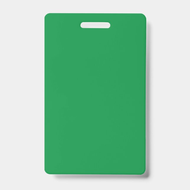 A dense, lush forest filled with vibrant green tre ID badge (Front)