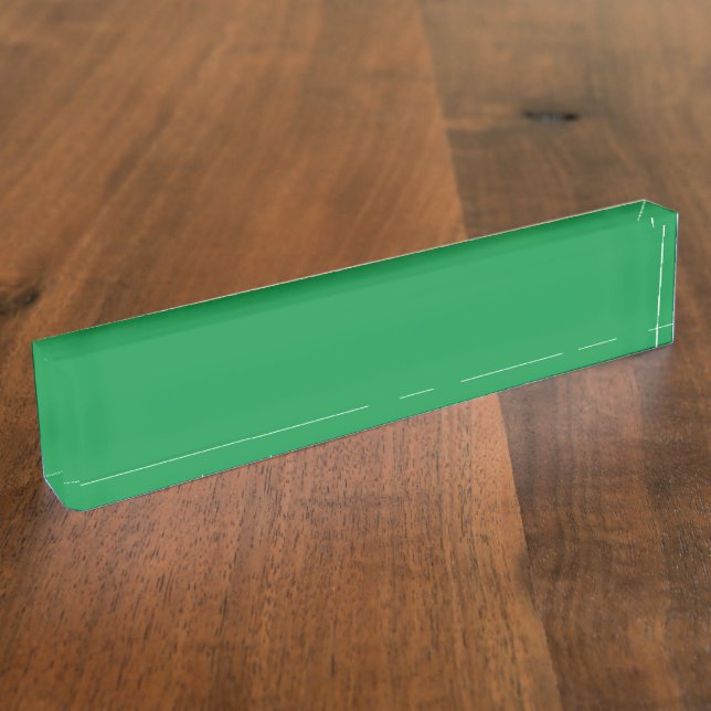 A dense, lush forest filled with vibrant green tre nameplate (Side)