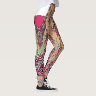 a design of a pink and brown paisley pattern leggings