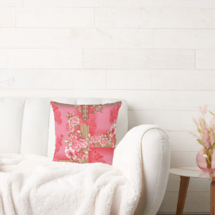 a design of a pink and gold background with a red  cushion