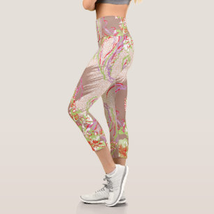 a design of a red vase with flowers on it capri leggings