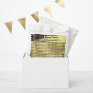 a design of a vase with flowers in it favour bags