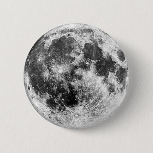 A distinctive brooch with a moon motif 6 cm round badge